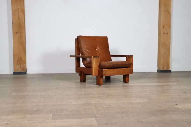 Midcentury modern Brutalist lounge chair in oak and leather, Italy 1970s