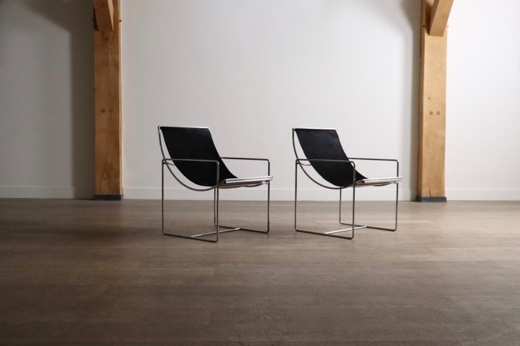 Side view of Odile Mir Filo Lounge Chairs Model 203 with sculptural chrome construction.