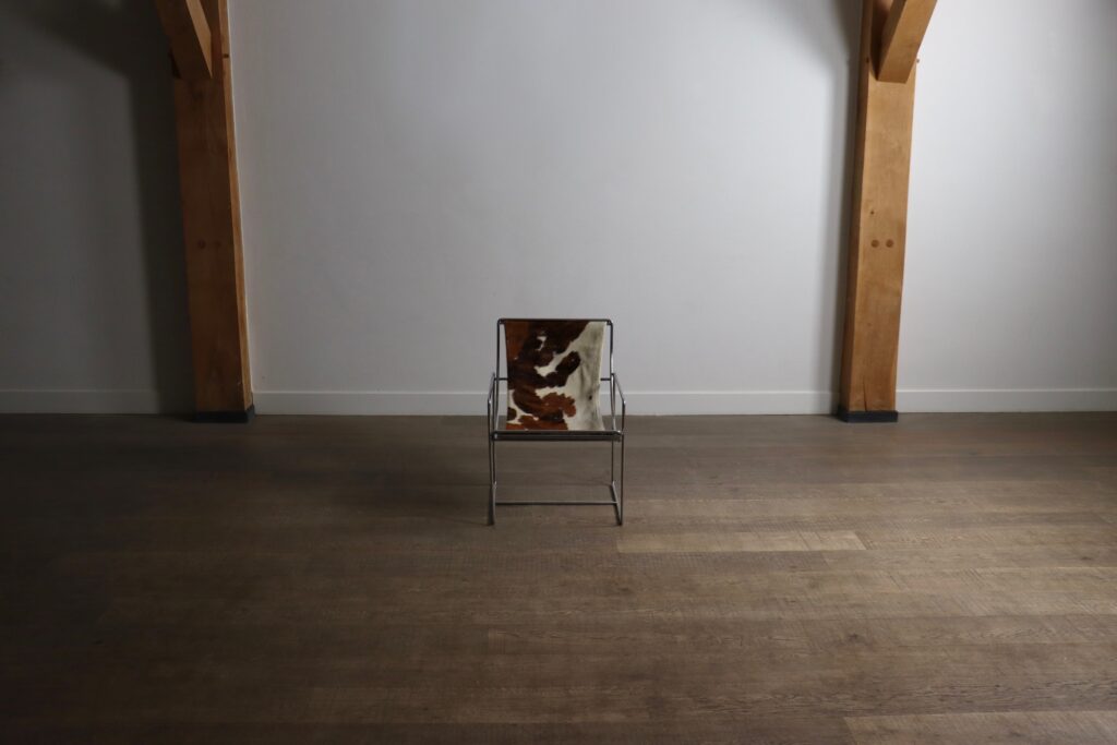 French 1970s Filo lounge chair by Odile Mir for Prisunic, shown with original cowskin seat.
