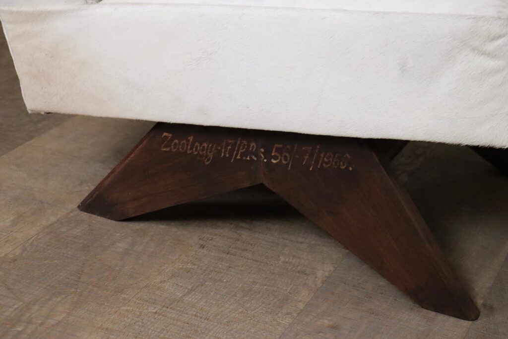 Solid teak frame detail of a Pierre Jeanneret Fireside chair from Chandigarh